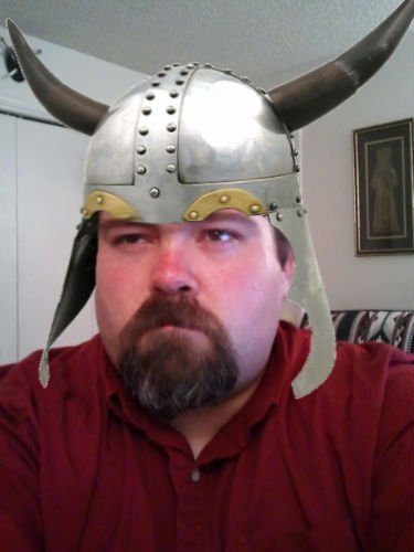 Justin wearing a poorly photoshopped "viking" helmet